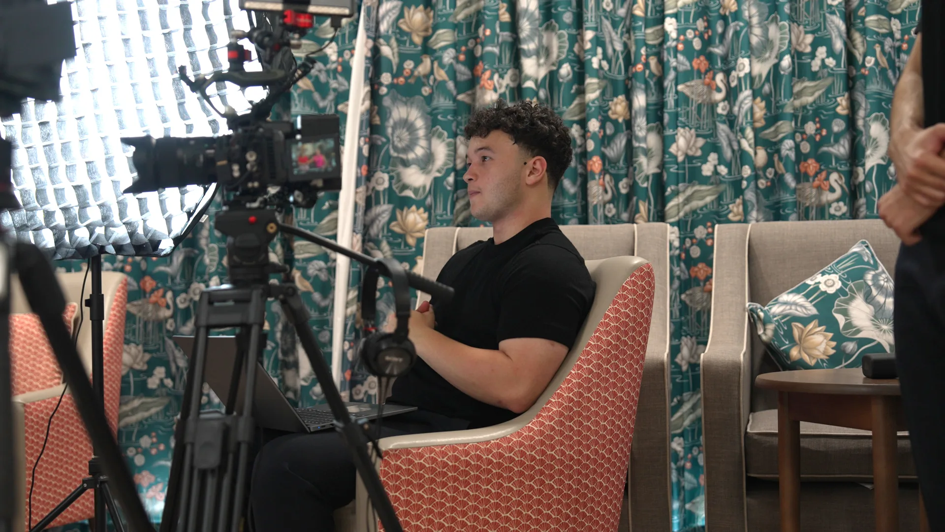The Heritage film crew at work during a filming day inside a care home.